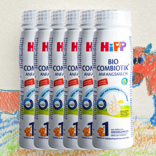 Multiple bottles of HiPP Bio Combiotik Anfangsmilch on a colorful background