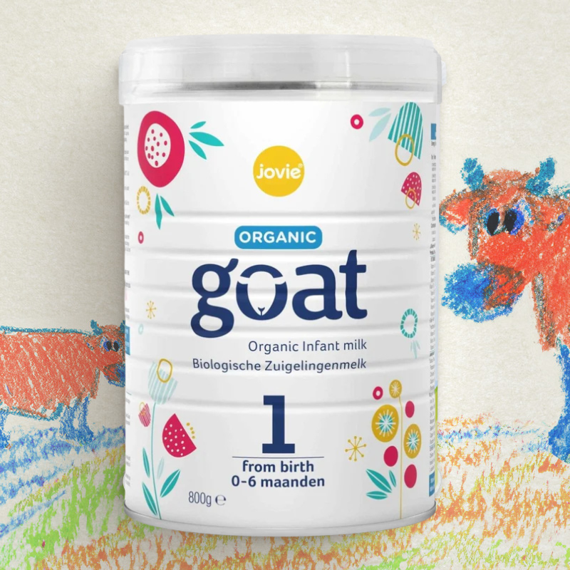 Jovie Organic goat infant milk powder container with colorful cow illustrations on a light background