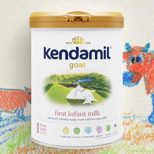 Kendamil goat milk powder container on a colorful background
